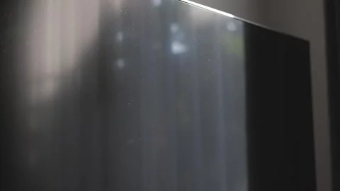 Light reflection on dust and dirty Tv screen or computer monitor. Video stock 276202613