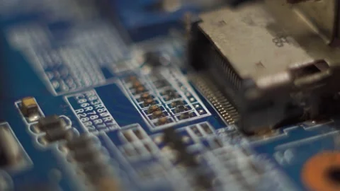 Light reflection effect on computer motherboard taken macro angel Stock Footage 205562432
