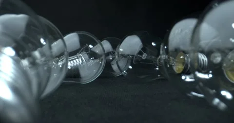 Light reflection in the light bulbs on black background.Idea, creativity concept Stock Footage 143376569