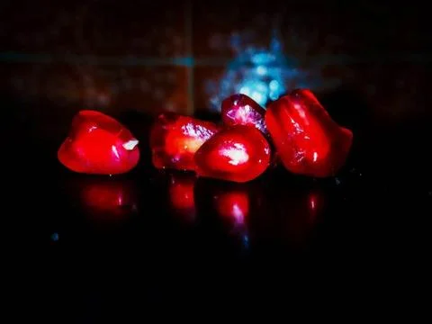 Light reflection on pomegranate pulp Stock Photos