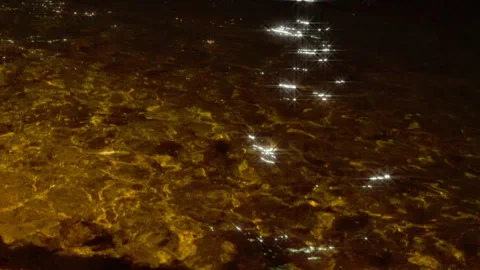 Light reflection in the sea at night Stock Footage 260599127