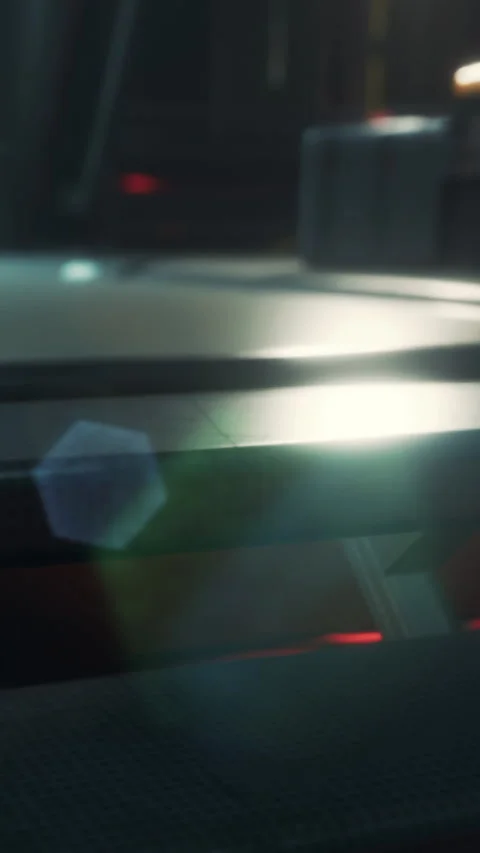 Light reflection on a surface near a metallic object in a dim room Stock Footage 337930162