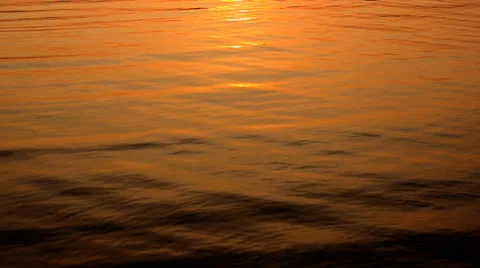 Light reflection in the water between sunrise. natural composition Stock Footage 37114521