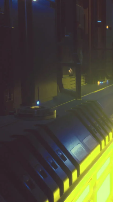 Light reflects off a metallic surface in a modern industrial setting at night Stock Footage 335093382