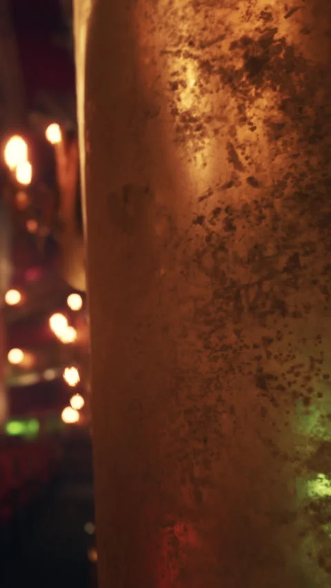 Light reflects on a textured surface in a dimly lit interior space Stock Footage 338380760