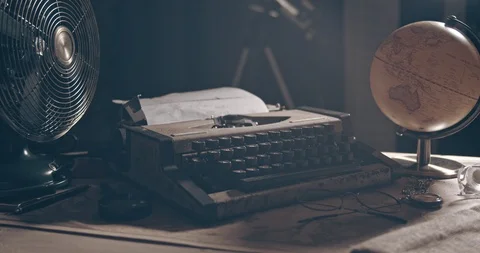Light Revealing Typewriter. 1950s Scene Setup. Film or Movie Opening Shot 4K Stock Footage 114293759