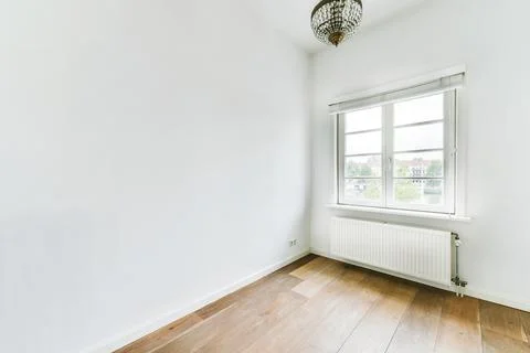 Light room with fireplace and counters Stock Photos
