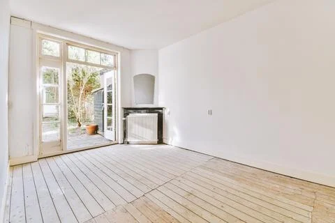 Light room with fireplace and counters Stock Photos