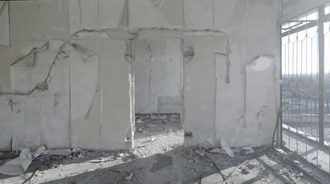 A light room in an old abandoned building, through the broken glass in the Stock Footage 124278331