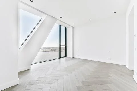 Light room with panoramic windows in apartment Stock Photos
