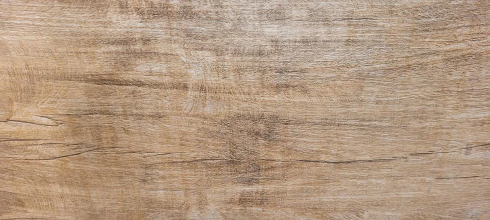 Light rustic wood background with dark veins on natural panel Stock Photos