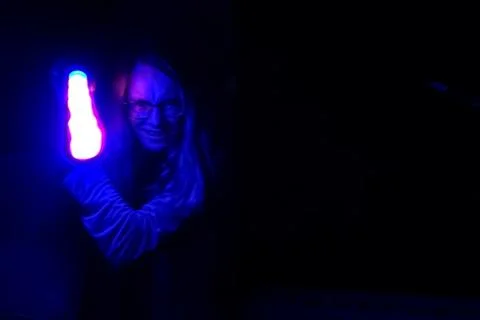 Light saber fun in the dark . Laser sword fight scene . Long exposure time . Foto stock