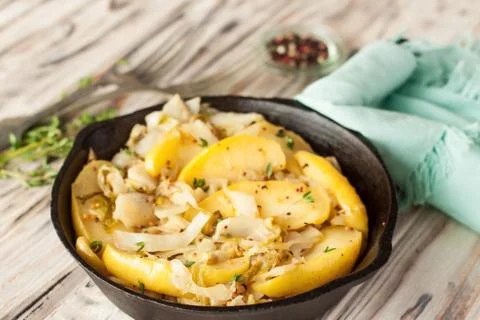 Light sauteed cabbage with apples Stock Photos