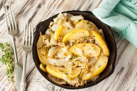 Light sauteed cabbage with apples Stock Photos