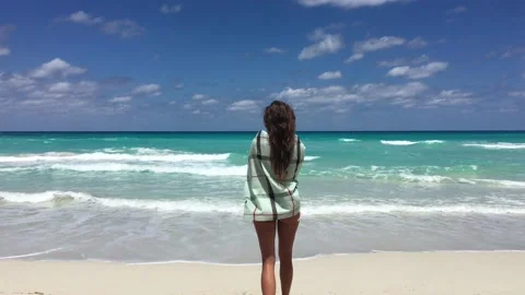 Light scarf waving in front of beautiful sea with turquoise water Stock Footage 170782422