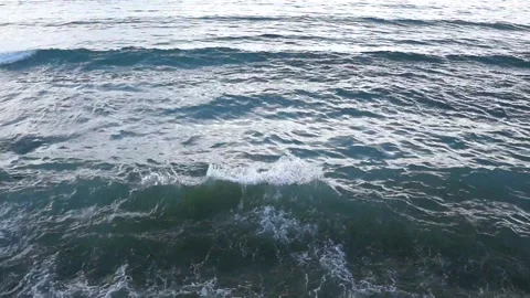 Light sea breeze on a cloudy day, rocky shore Stock Footage 145161146