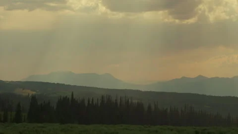 Light Shadow On A Cloudy Sky Over Mountains During Rainstorm. Timelapse Stock Footage 313997405