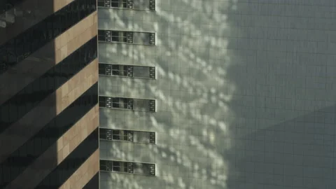Light, Shadows, Shapes Reflect on Buildings in Timelapse Vidéo 172086903