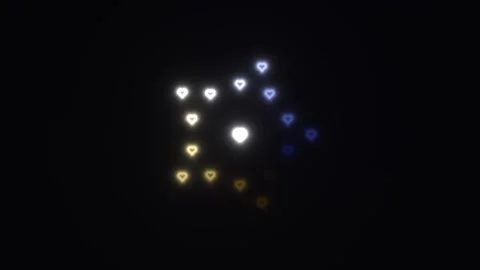 Light shapes dance in dark background with heart patterns Stock Footage 338236261