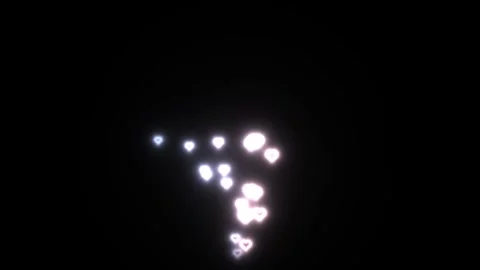 Light shapes forming hearts in a dark background at night 스톡 동영상 338179714