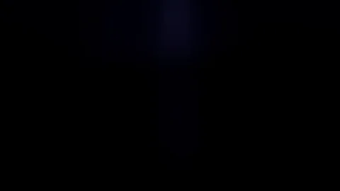 Light shines into an anamorphic lens Stock Footage 87920804