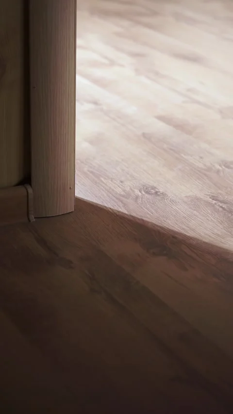 Light shines from door opening in dark room Stock-Footage 310539320