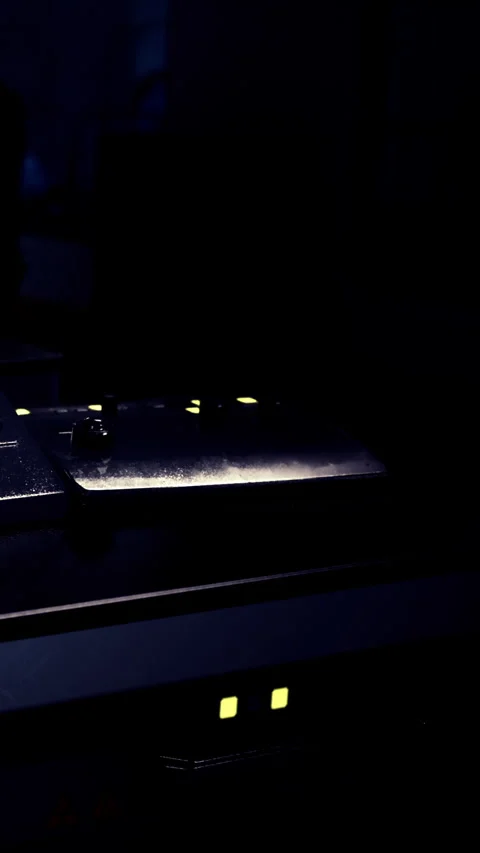 Light shines on objects in dark space in close view during night hours Stock Footage 337951759