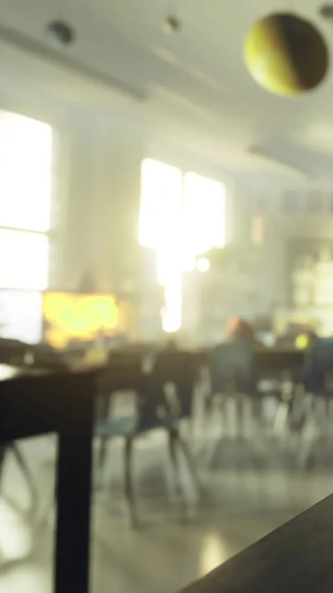 Light shines through classroom window during afternoon study session Stock Footage 332226451