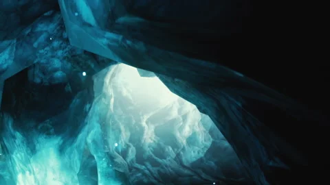 Light shines through cracks in the ice cave revealing blue hues and textures Stock Footage 343516998