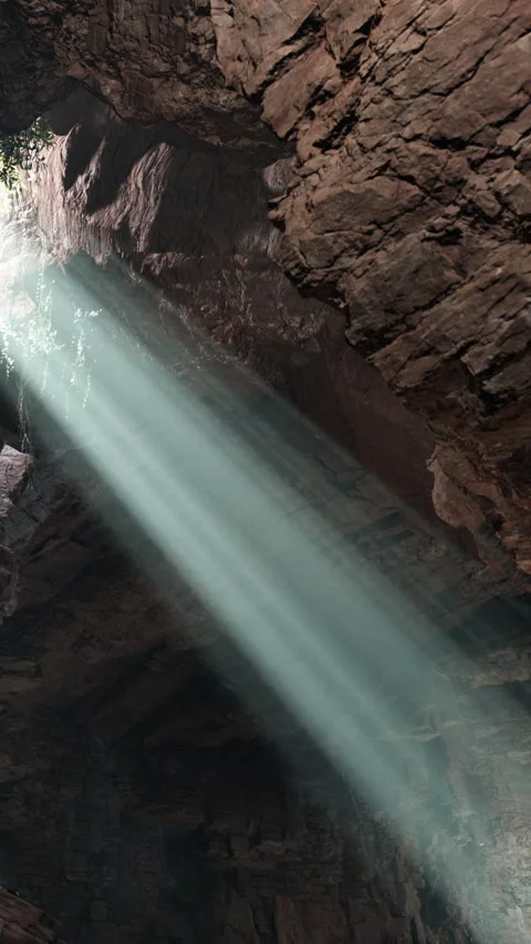 Light shines through a gap in the canyon at midday in a remote location Stock Footage 341964527