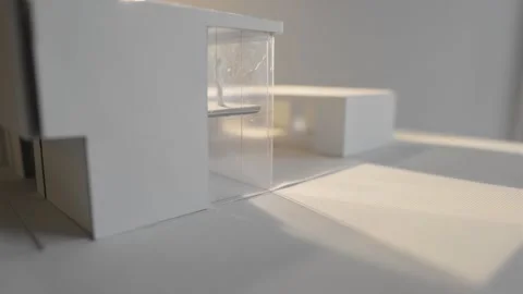 Light shines through a scale model Stock Footage 288992251