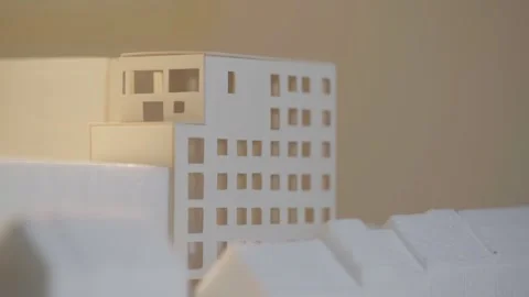 Light shines through a scale model Stock Footage 288992291