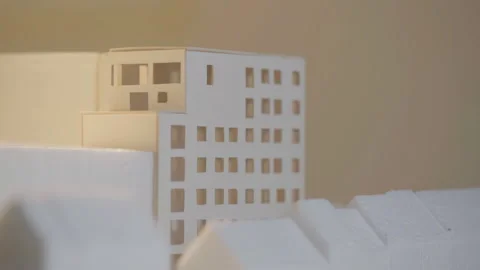 Light shines through a scale model 스톡 동영상 289391589