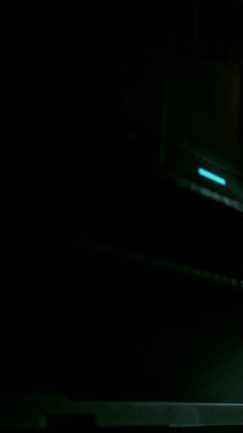 Light shines on workspace during late night hours in a home office setting Stock Footage 335692635