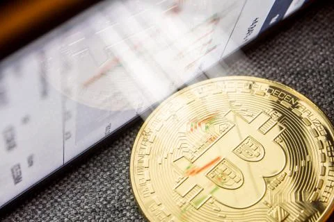 Light shining bright on bitcoin digital currency Stock Photos