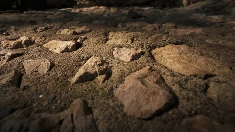 Light shining on cobbled ground Stock Footage 137961157