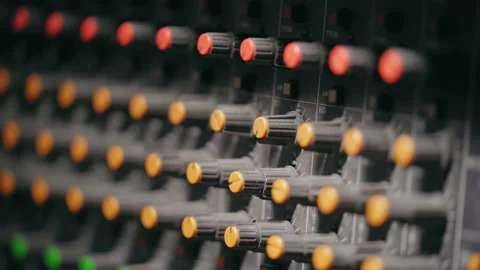 Light Shining On Control Knobs Of Mixing Console At Recording Studio. - 動画素材 217671007