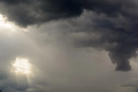 Light shining through the clouds Stock Photos