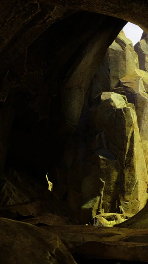 Light shining through rocks in a cave during daytime hours Stock Footage 330163158