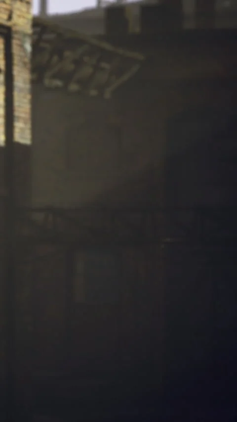 Light shining through the window of an old building in the evening hours Stock Footage 334259196