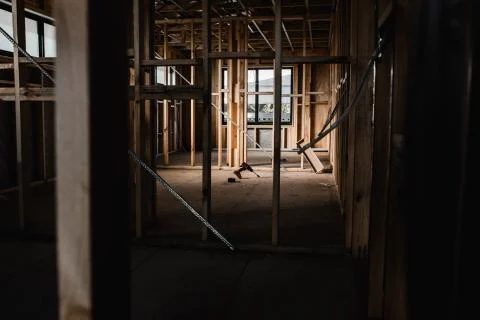 Light shining in on tools being used to build a house Stock Photos