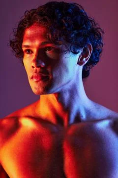 Light, shirtless or man in studio with art lighting and thinking with self care Stockfoto's
