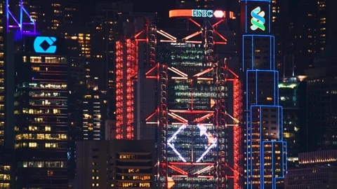 Light show on high-rises in Hong Kong at night time Stock Footage 124996496