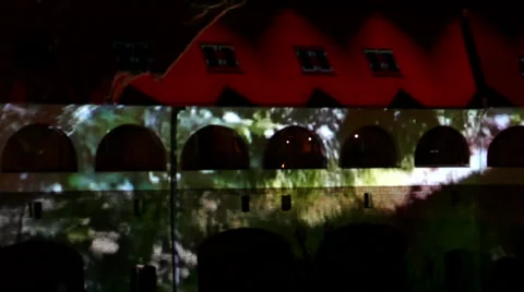 Light show projected on buildings Stock Footage 54799913