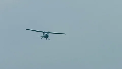 Light single aircraft in the air Stock Footage 69934782
