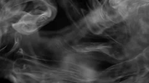 Light smoke on a black background moves at the left to the right. Stock Footage 93453347