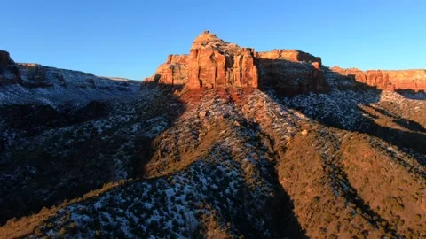 Light snow on red cliffs at Colorado National Monument Video stock 322123426