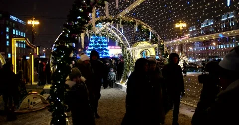 Light snowfall, the art object shines on the streets Stock Footage 67393980