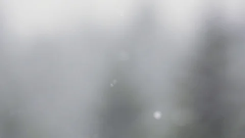 Light snowflakes floating through the air Stock Footage 78450163