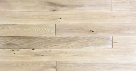 Light soft wood surface as background, wood texture. Wood planks. Stock Photos